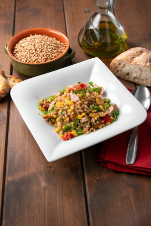 Photo for Delicious spelt salad with mozzarella and vegetables - Royalty Free Image