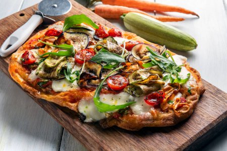 Photo for Delicious vegetarian pinsa, a typical roman pizza with vegetables, Italian food - Royalty Free Image
