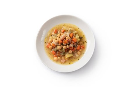 Foto de Placa de deliciosa sopa con frijoles y varias verduras, comida vegetariana - Imagen libre de derechos