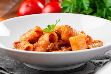 Photo for Penne al arrabbiata, a traditional recipe of Italian pasta, European food - Royalty Free Image