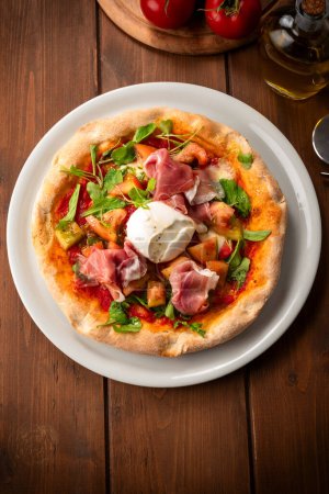 Photo for Close-up shot of delicious pizza with prosciutto crudo - Royalty Free Image