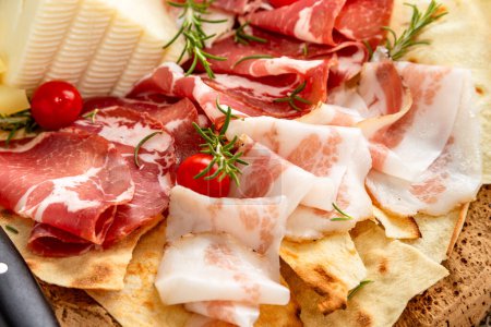 Platter of delicious mixed appetizers, Italian Antipasti