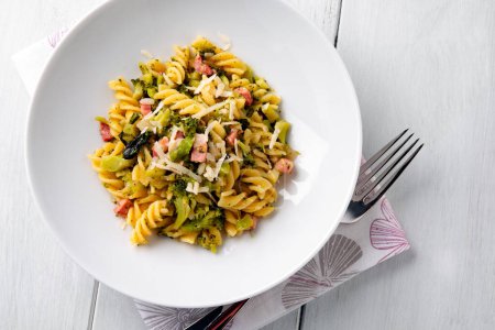 Photo for Plate of delicious pasta with pork sausage and broccoli, italian food - Royalty Free Image