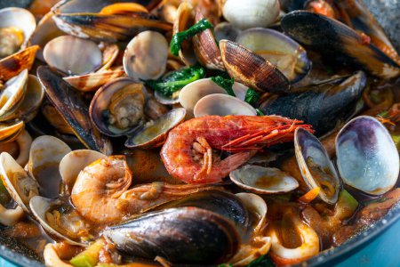 Photo for Pan with delicious seafood soup, italian food, mediterranean cuisine - Royalty Free Image