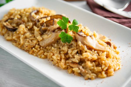 Photo for Tray with delicious mushroom risotto, italian food - Royalty Free Image