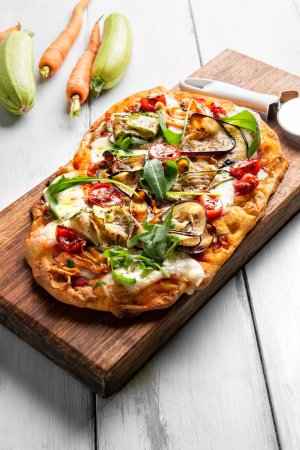 Photo for Delicious vegetarian pinsa, a roman style pizza with various vegetables, italian pizza, european food - Royalty Free Image