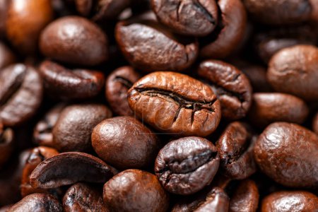 Téléchargez les photos : Vue rapprochée des grains de café bruns - en image libre de droit