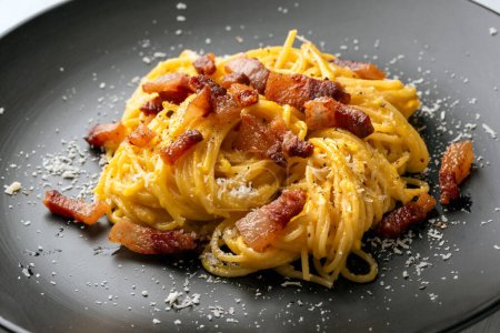 Photo for Close-up shot of delicious pasta with chopped ham - Royalty Free Image