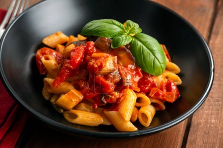 Photo for Close-up shot of delicious pasta with tomato sauce - Royalty Free Image