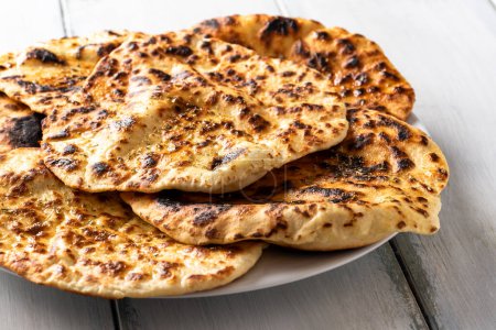 Closeup of delicious naan breads, Indian food 