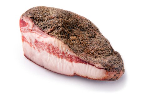 A piece of guanciale isolated on a white background, a typical product of Italian cuisine