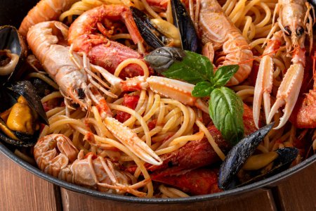 Photo for Spaghetti allo scoglio, a typical recipe of pasta with seafood sauce, italian food - Royalty Free Image