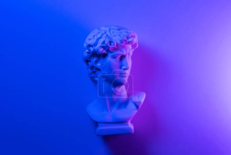 Photo for Toy miniature David's sculpture in neon lights. - Royalty Free Image