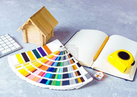 Téléchargez les photos : Construction, design project and repair of the house concept with color palette fan at the workspace. - en image libre de droit