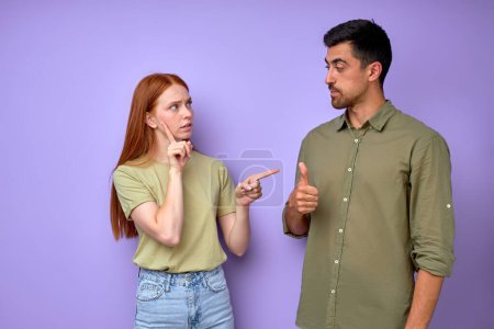 Photo for Red-haired wide asking her boyfriend to shave his beard, couple talking chatting with gestures, hands palms family love lifestyle close up portrait isolated blue background - Royalty Free Image