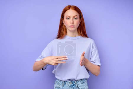Photo for British sign language. A two-handed alphabet. Fingerspelling alphabet. ginger woman demonstrating number 300 - Royalty Free Image