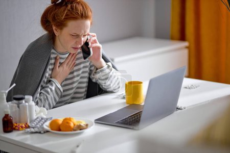Photo for Sick frustrated angry redhead girl making phone call to friend, family, doctor, complaining about her terrible illness, close up side view portrait conversation chat - Royalty Free Image