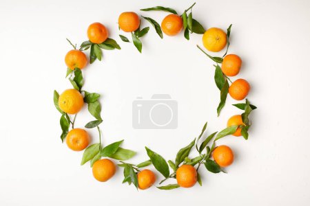Foto de Piso de invierno con mandarinas. - Imagen libre de derechos