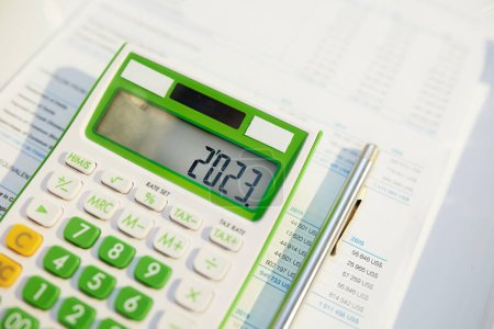Photo for Tax time. calculator and documents on the table. - Royalty Free Image