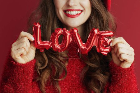 Foto de Happy Valentine. Closeup on woman with love inscription. - Imagen libre de derechos