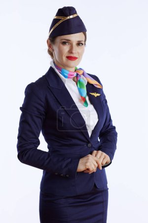 Photo for Elegant air hostess woman against white background in uniform. - Royalty Free Image