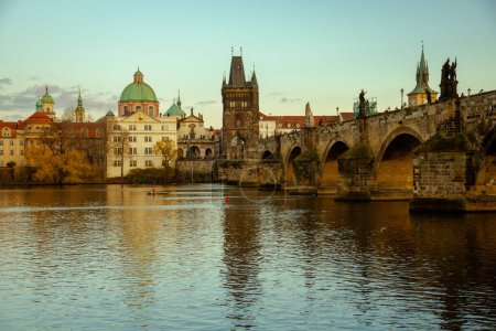 Landscape with Vltava river and Karlov most in the evening in autumn in Prague, Czech Republic.