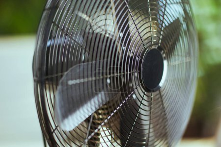 Photo for Summer time. Closeup on electric ventilator. - Royalty Free Image