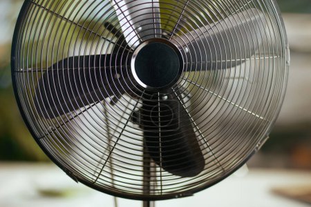 Photo for Summer time. Closeup on metal fan. - Royalty Free Image