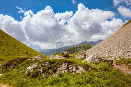 Photo for Summer time in Dolomites. landscape with hills, clouds and rocks. - Royalty Free Image