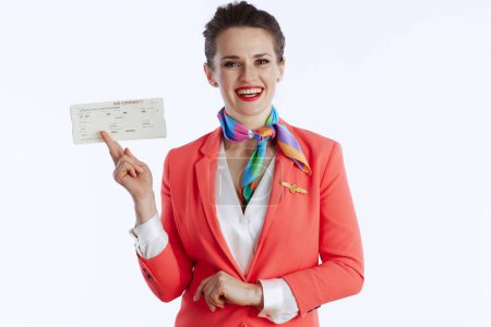 Photo for Happy modern female air hostess isolated on white background in uniform with flight tickets. - Royalty Free Image