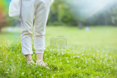 Photo for Summer time. Closeup on female in the meadow outside in nature. - Royalty Free Image