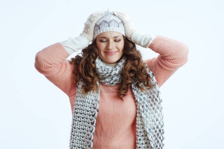 Photo for Hello winter. excited trendy female in sweater, mittens, hat and scarf isolated on white. - Royalty Free Image