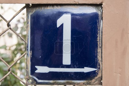 Photo for Weathered grunge square metal enameled plate of number of street address with number 1 - Royalty Free Image