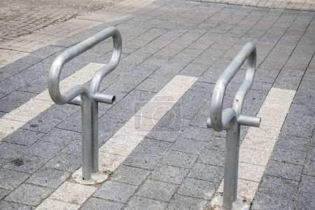 Photo for Bicycle rack bollards closeup in city street - Royalty Free Image