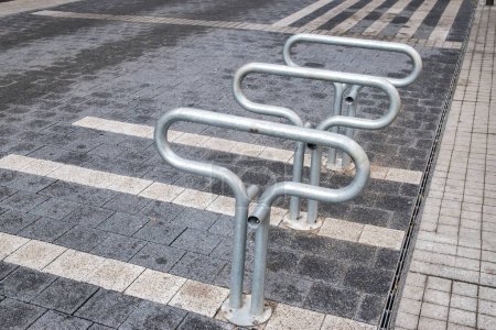 Photo for Bicycle rack bollards closeup in city street - Royalty Free Image