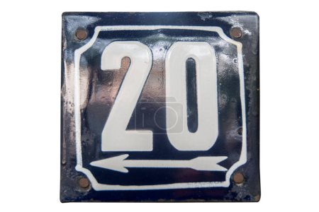 Weathered grunge square metal enameled plate of number of street address with number 20 isolated on white background