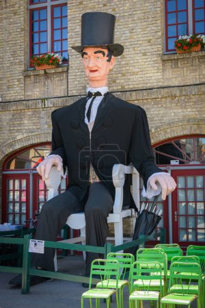 Photo for Bergues, France - July 5, 2022: A marionette of bergues in france in front of a building, summer day - Royalty Free Image