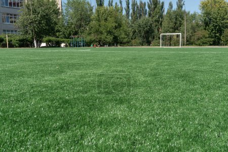 Photo for Marking on a modern stadium with artificial turf. School stadium. - Royalty Free Image