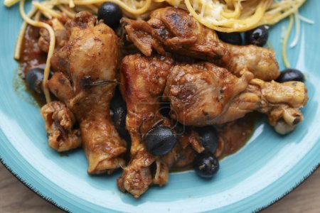 Photo for Italian chicken Cacciatore hunter's stew with spaghetti noodles - Royalty Free Image