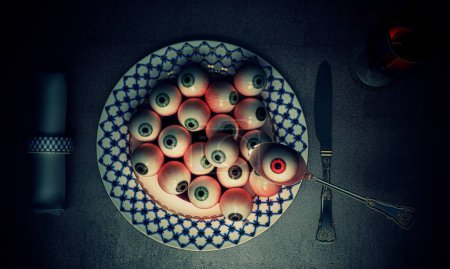 Photo for Dish containing eyeballs, horror scene, prank for halloween - Royalty Free Image