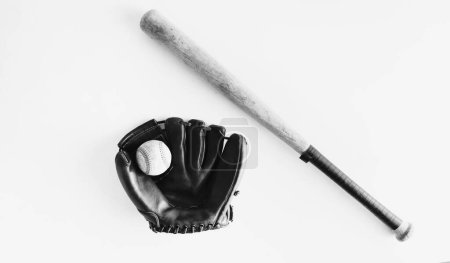 Photo for Old vintage texture of baseball bat and ball with glove, isolated against background in black and white with copy space for sport. - Royalty Free Image