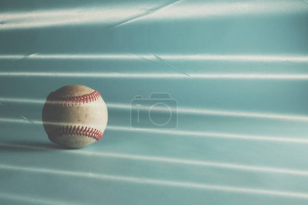 Photo for Close up view of baseball ball on linear background - Royalty Free Image