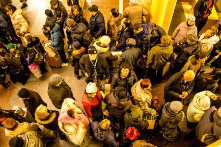 Photo for The inahabitants of Kherson have been ordered to evacuate the city. The meeting point is at the train station where hundreds of people have gathered to take the night train that will take them to Kyiv - Royalty Free Image