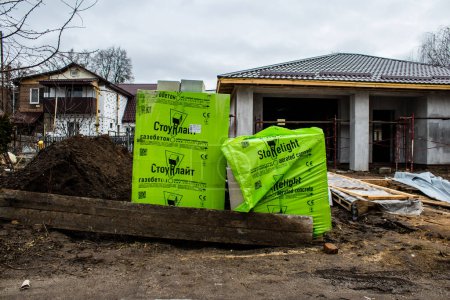 Photo for Several houses in Boucha, a Kyiv suburb, are being repaired or restored following the shelling of the Russian army. Work has started and is funded by the Ukrainian government - Royalty Free Image