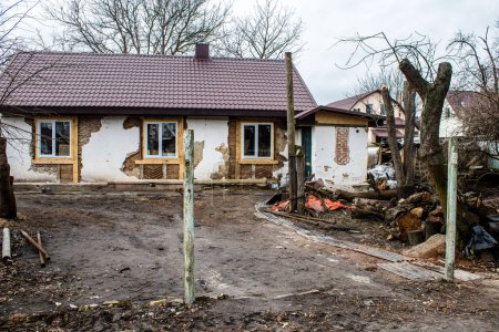 Photo for Several houses in Boucha, a Kyiv suburb, are being repaired or restored following the shelling of the Russian army. Work has started and is funded by the Ukrainian government - Royalty Free Image