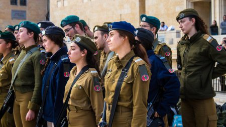 Photo for Jerusalem, Israel  December 28, 2023 Induction ceremony for new graduates of the IDF officer school. Soldiers come from various battalions and after two months of training they are appointed officers - Royalty Free Image