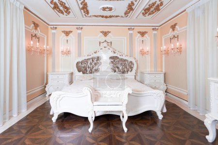 Photo for Small luxury bedroom with bath and expensive furniture in a chic old baroque style. - Royalty Free Image