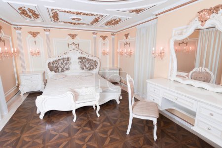 Photo for Small luxury bedroom with bath and expensive furniture in a chic old baroque style. - Royalty Free Image