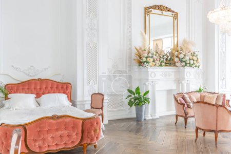 Photo for Royal baroque style luxury posh interior of large room. extra white, full of day light. high ceiling and walls decorated by stucco - Royalty Free Image