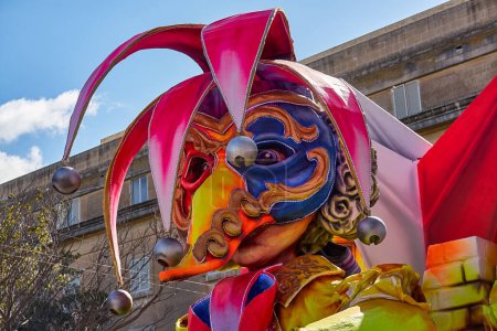 Foto de Annual Mardi Gras Fat Tuesday grand parade on maltese street of allegorical floats and masquerader procession: Valletta, Malta - February 23, 2020 - Imagen libre de derechos